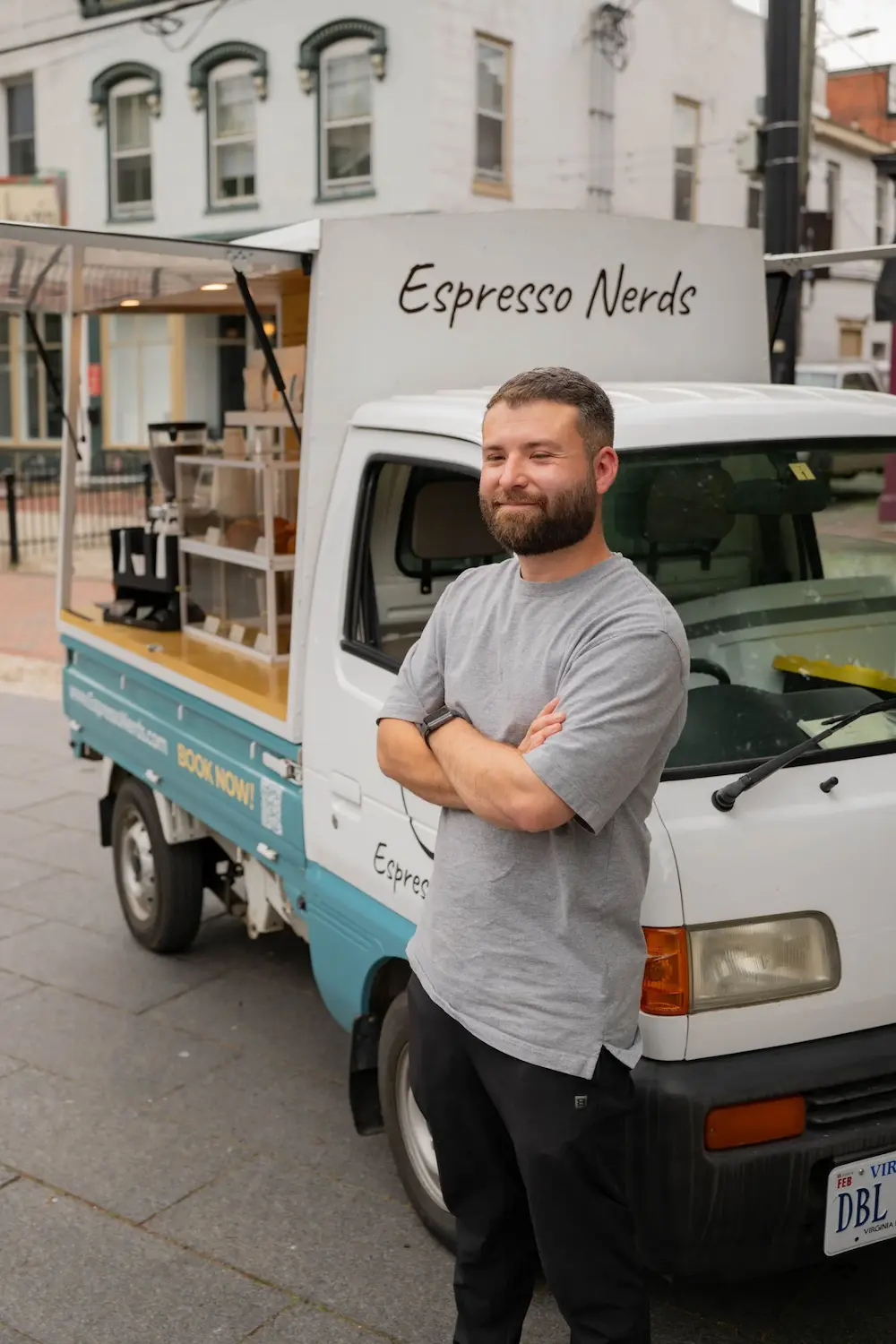 Espresso Nerds founder beside the Japanese kei truck espresso bar