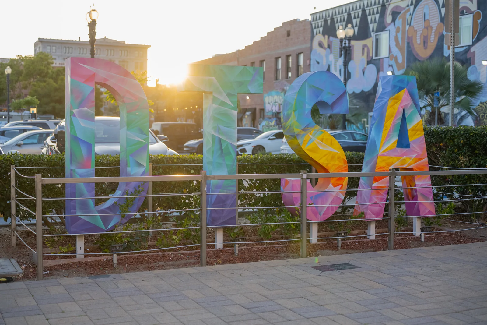 The painted DTSA letter sculpture in downtown Santa Ana at sunset