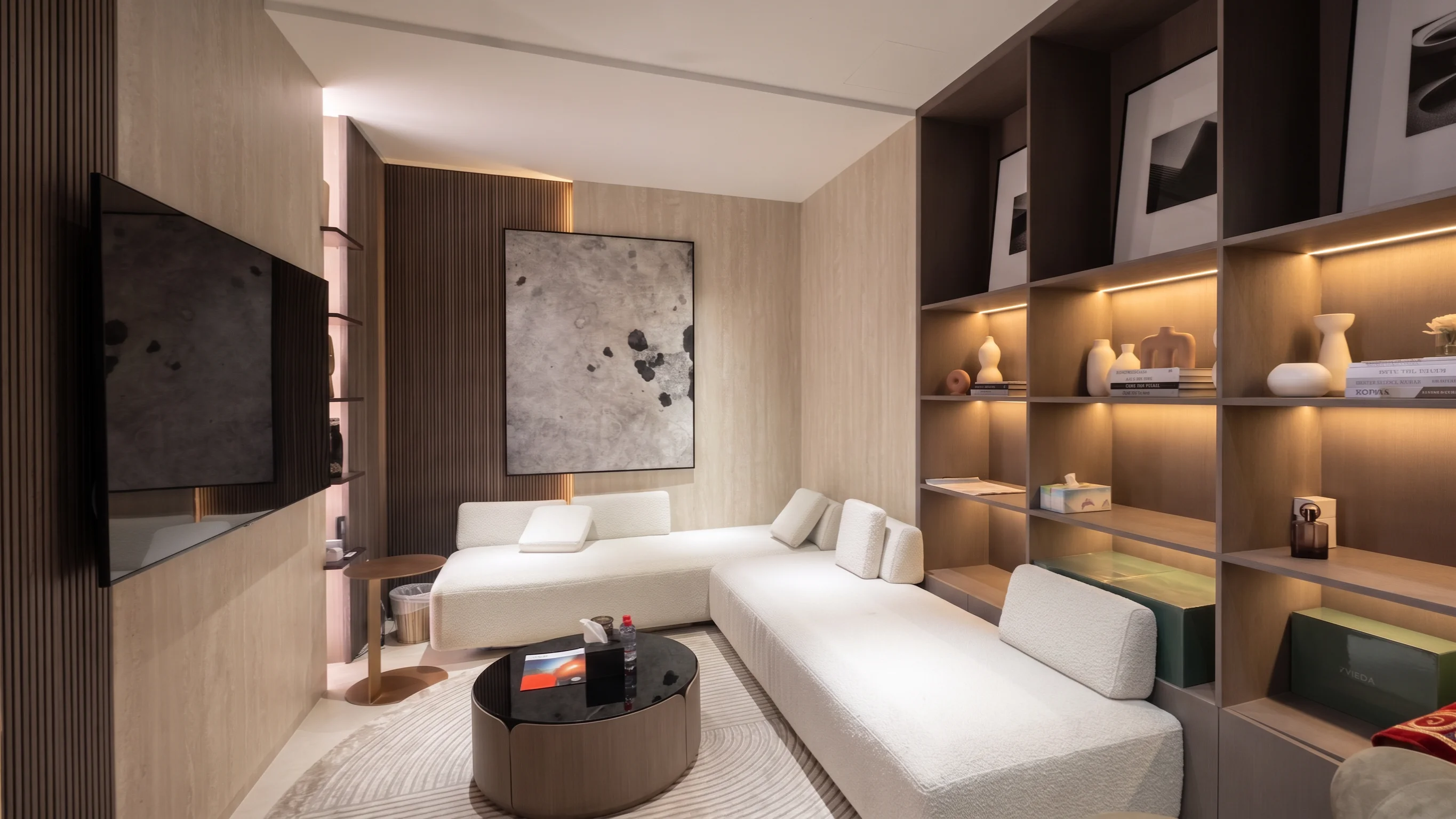 A furnished Zimaya living room with built-in shelving
