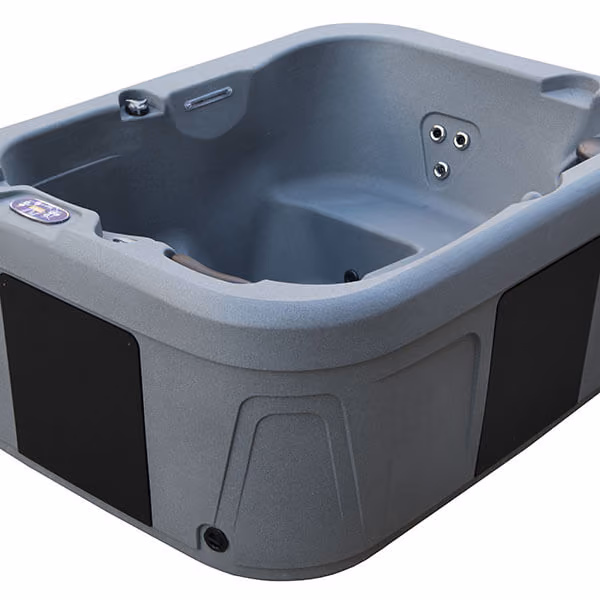 Gray plug-and-play hot tub with built-in seats and jet nozzles on white background.