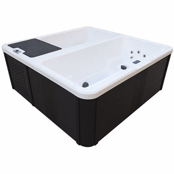 Modern black and white cold plunge tub with control panel and jet nozzles.