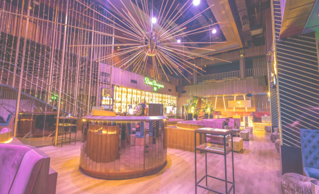 Seating and bar area inside Revel luxury lounge, The Palace Manila