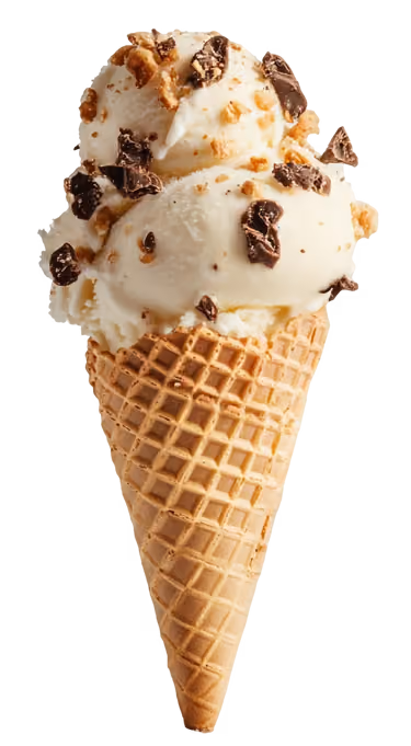 Vanilla ice cream scoops with chocolate chunks and nuts in a waffle cone.
