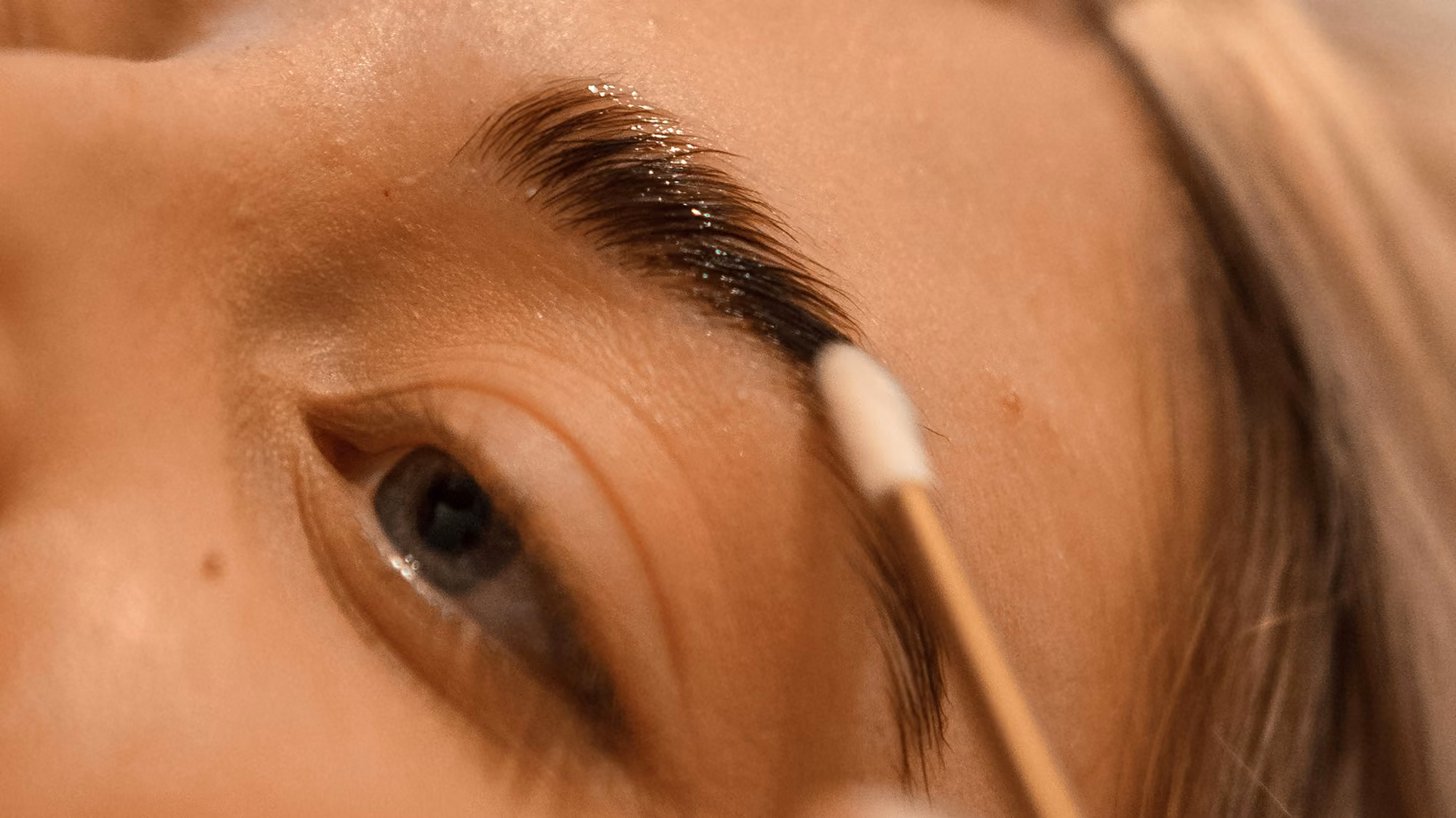 Close shot of woman's brows.