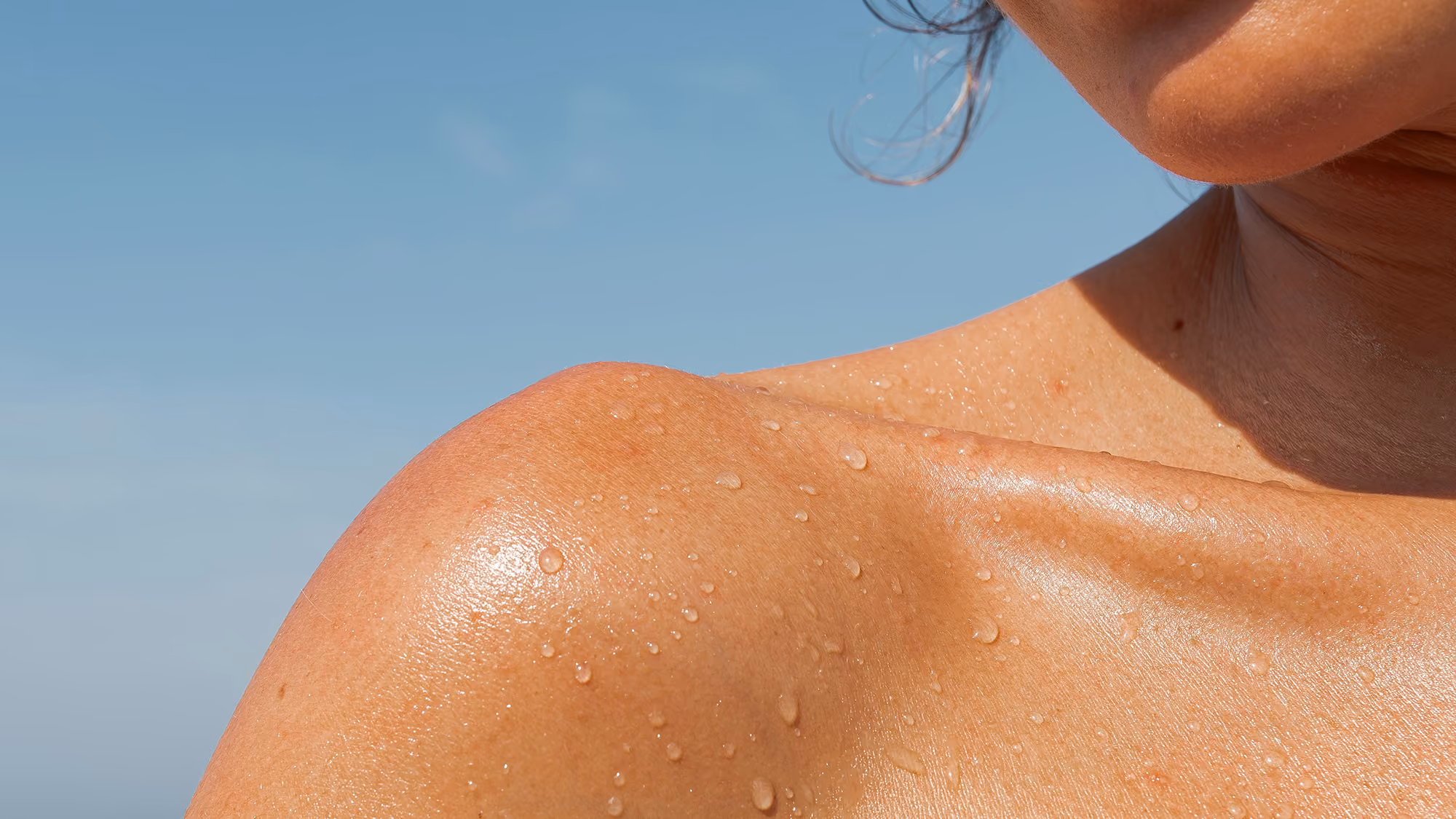 Woman's shoulder in the sun.