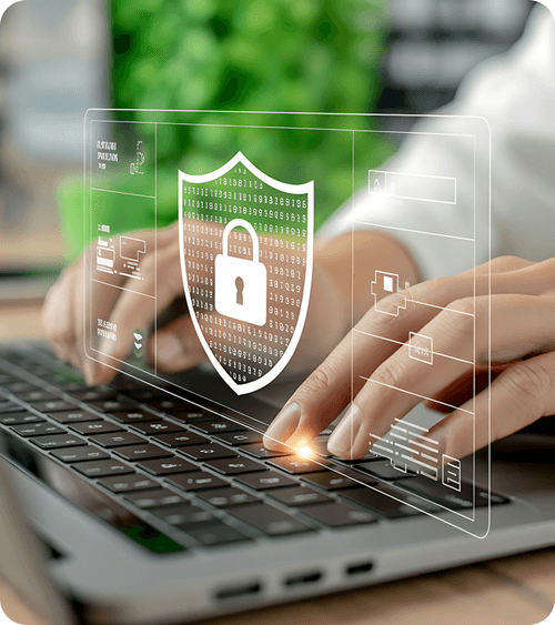 Hands typing on a laptop with a security shield overlay