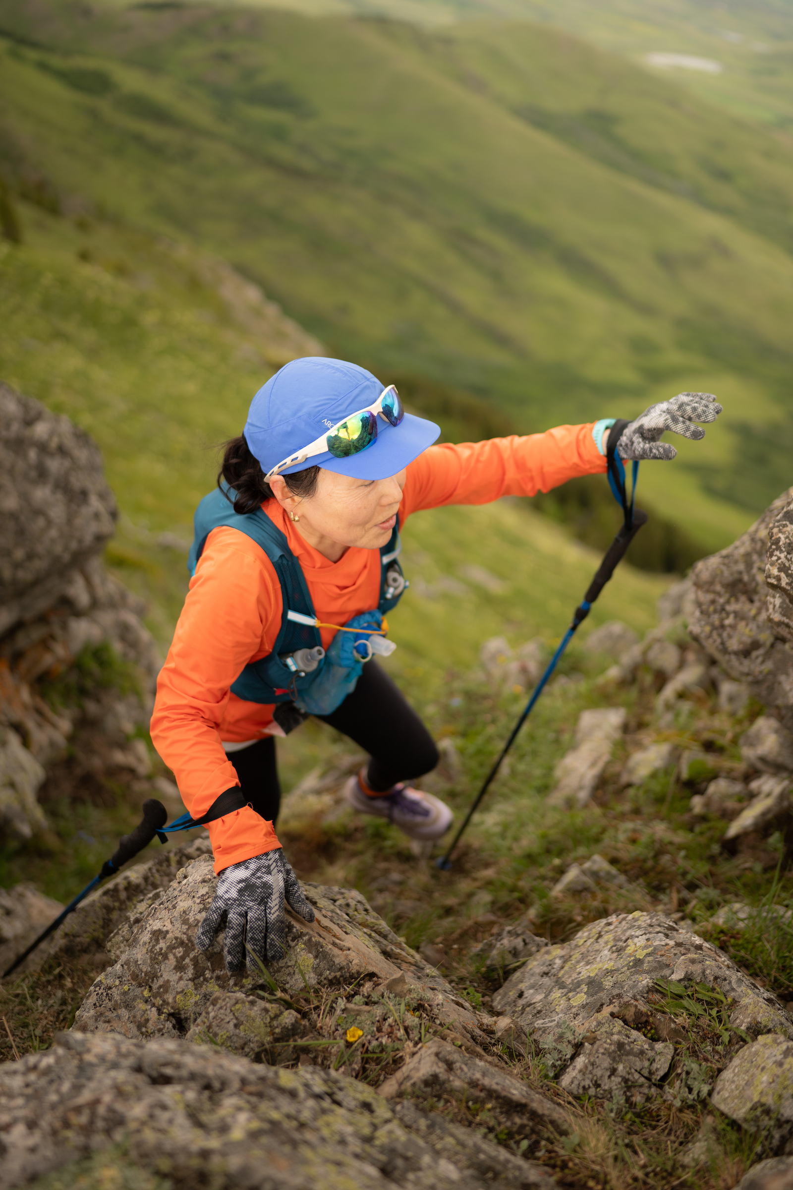 Runner in steep rocky terrain