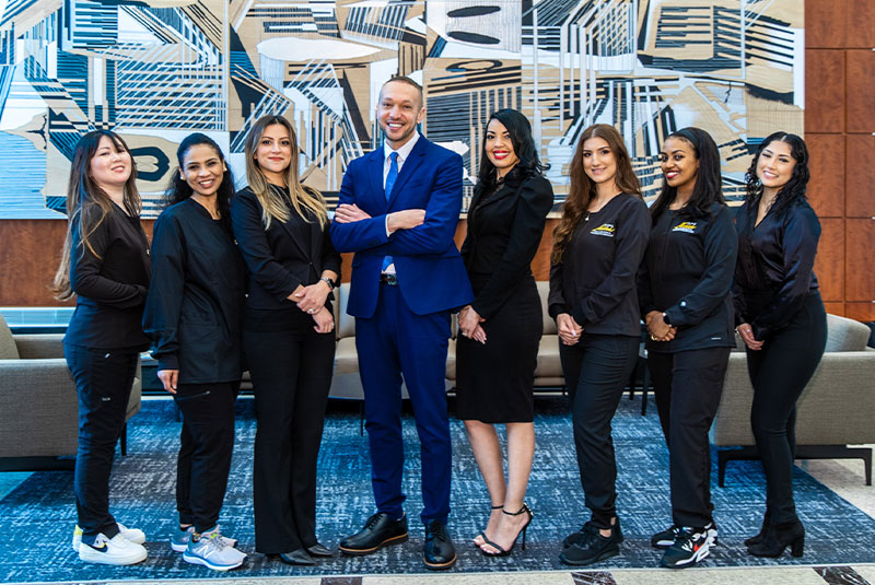 Dr. Nahlah with the practice team