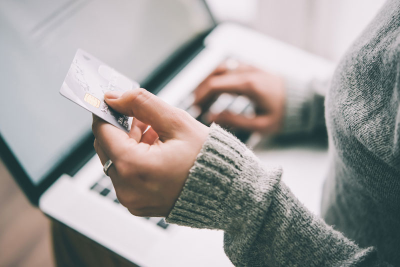 A patient arranging payment at the practice