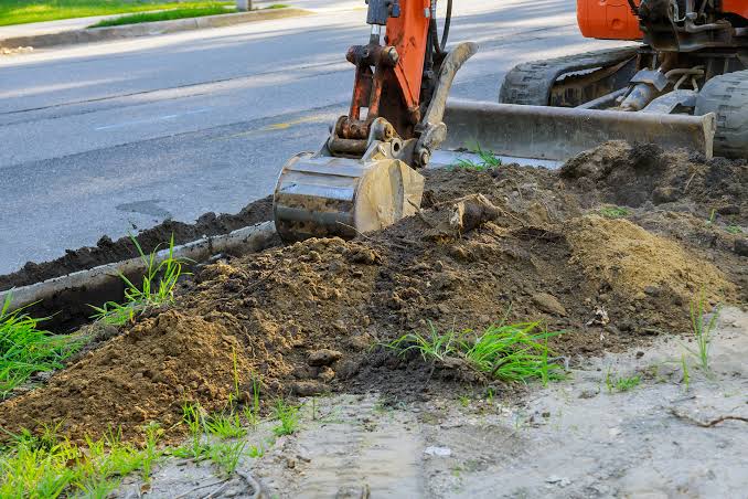 Heavy site work including yard grading and land clearing for a residential project near Westerly, RI.
