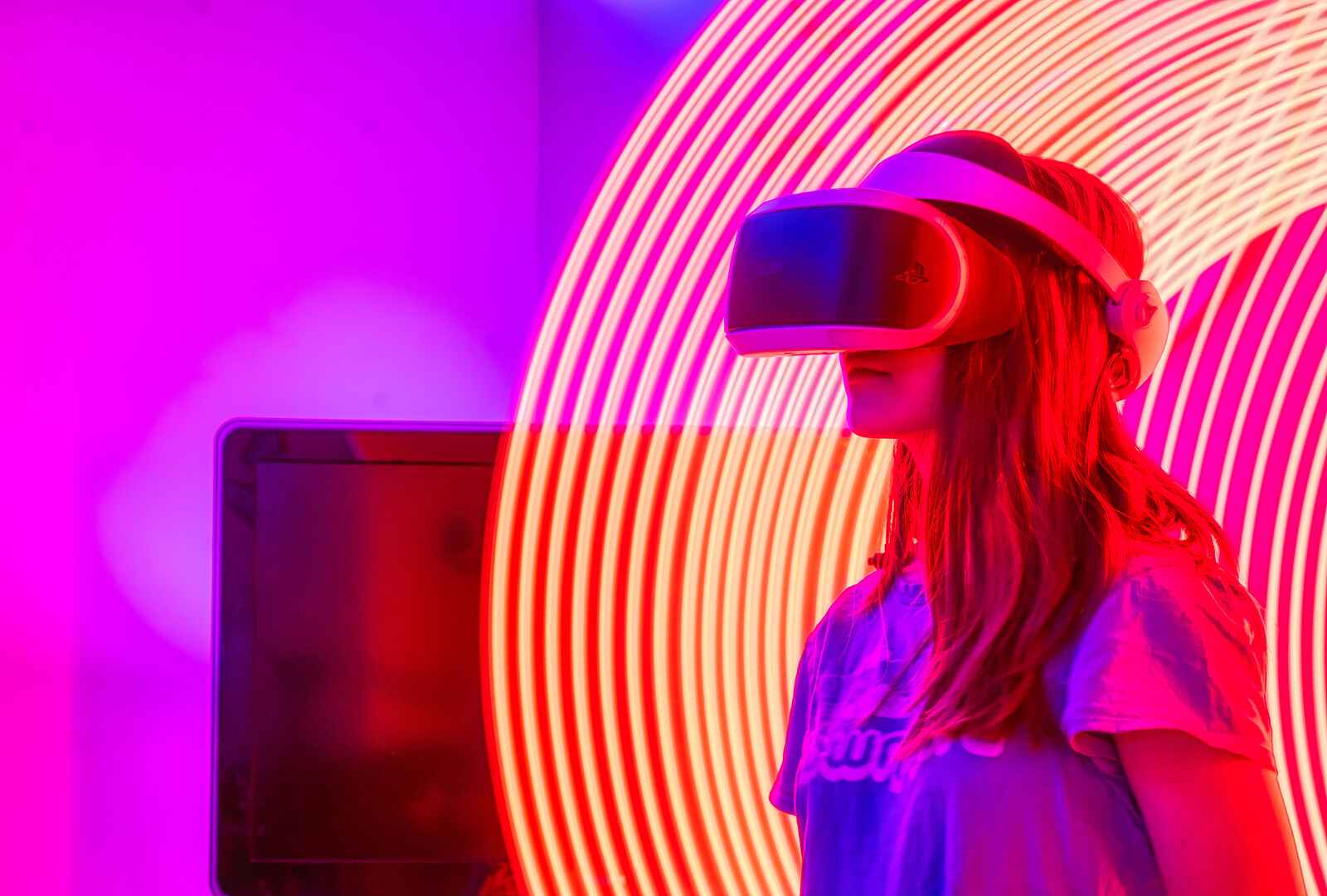 A girl wearing a VR headset.