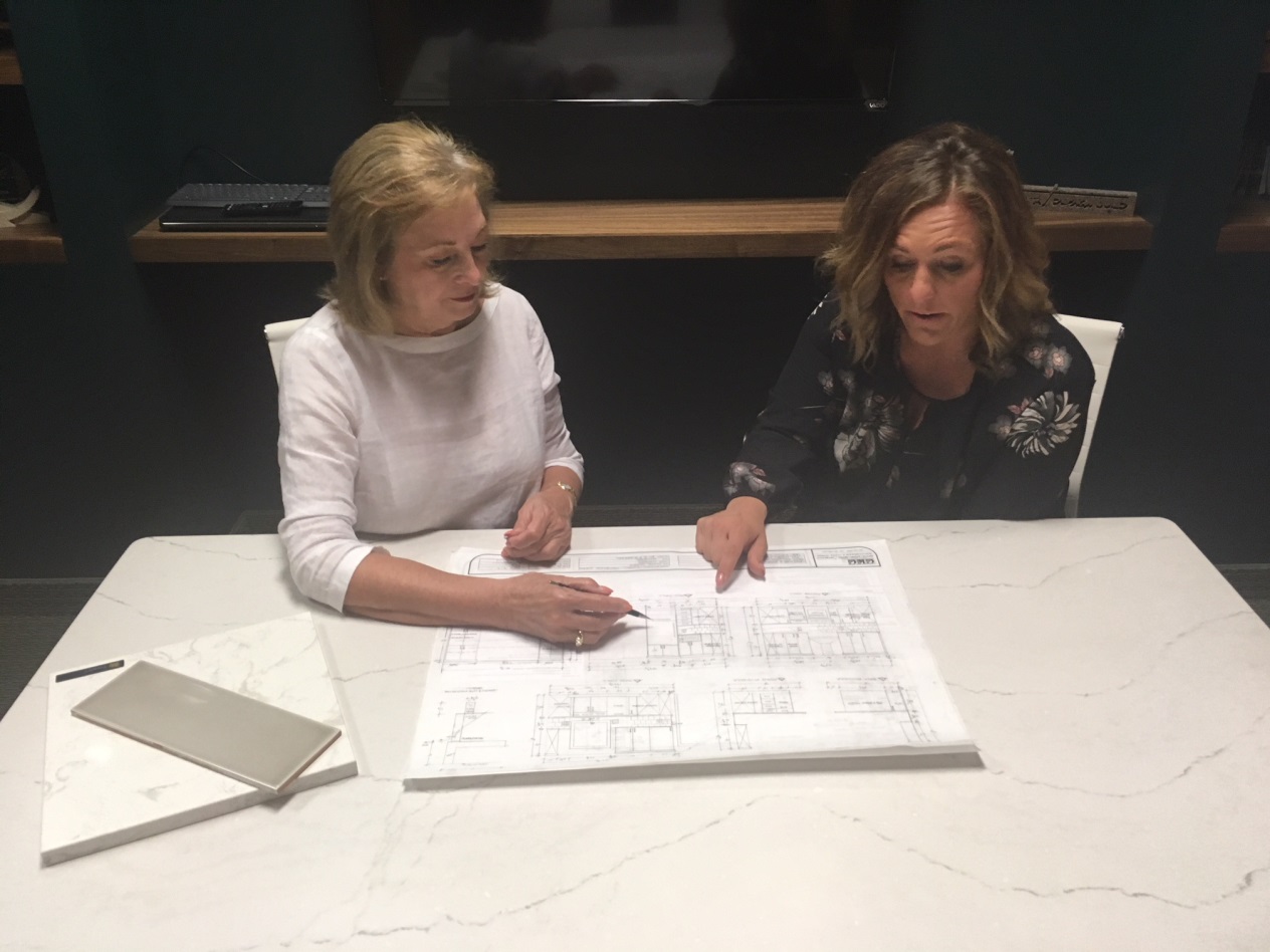 Crystal Kitchen + Bath designer meeting with a client