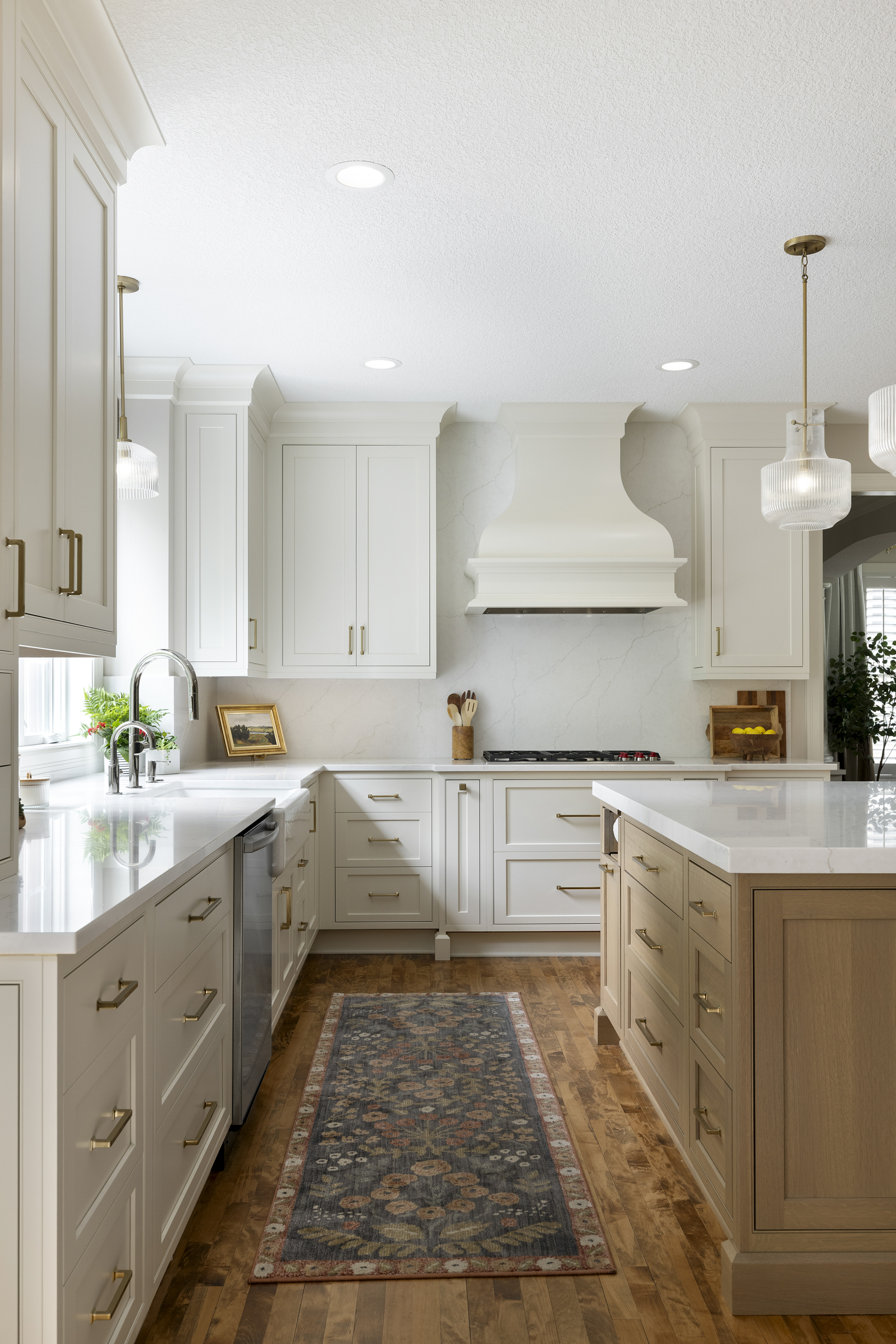 Kitchen remodel with waterfall countertop on the large island