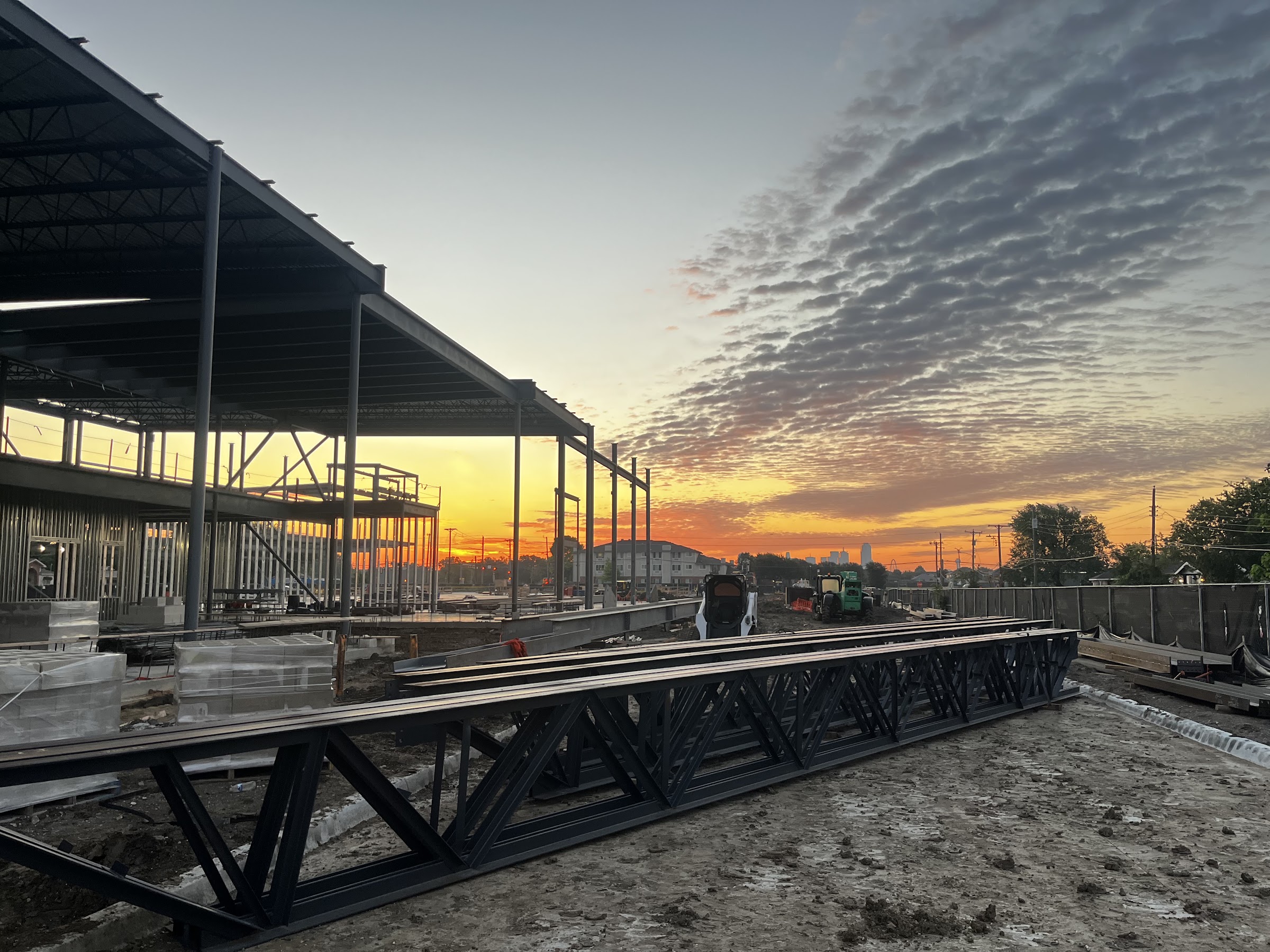 Career Institute West steel frame at sunset