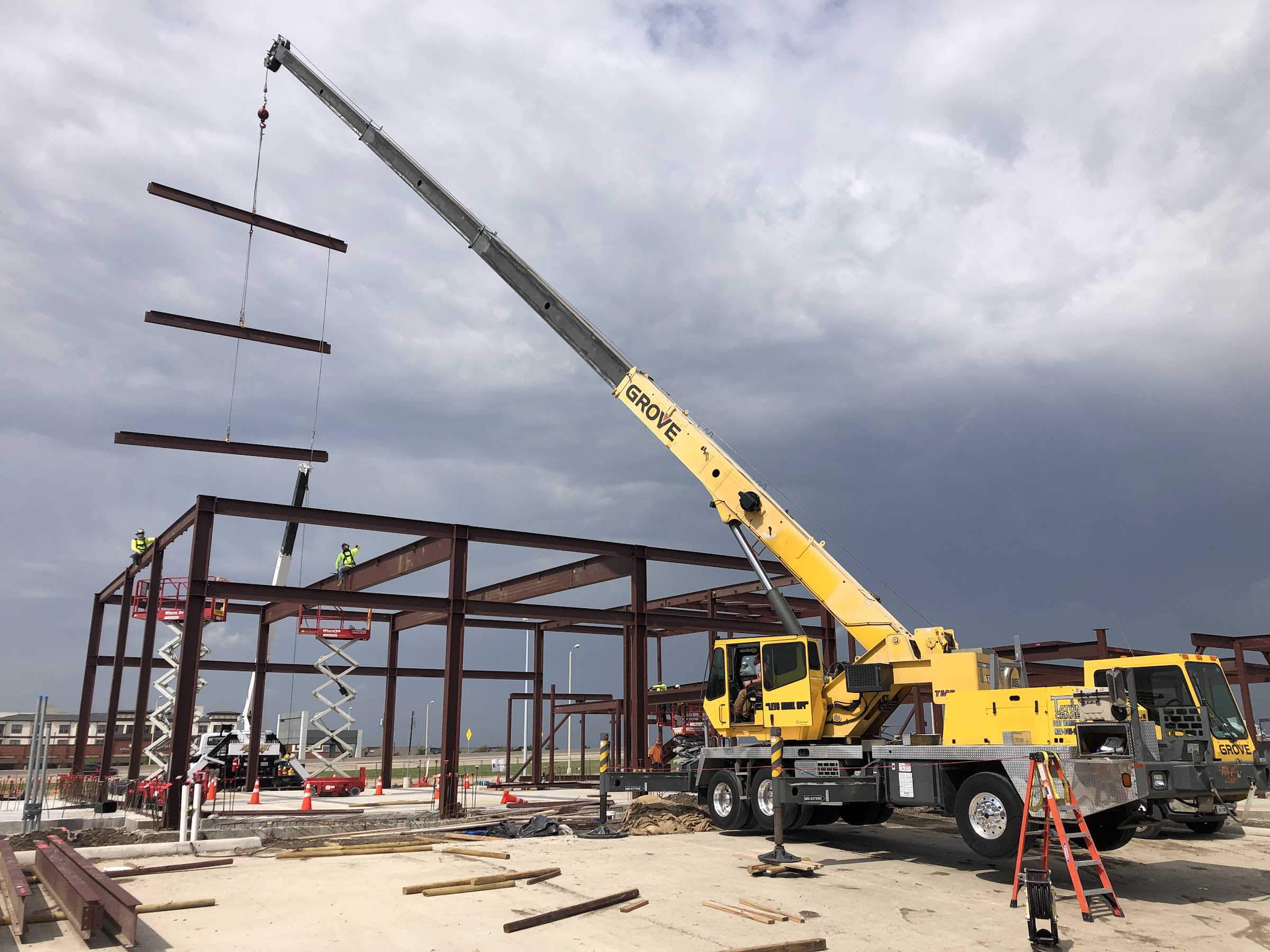 Crane setting steel on the frame of Garland Fire Station No. 6