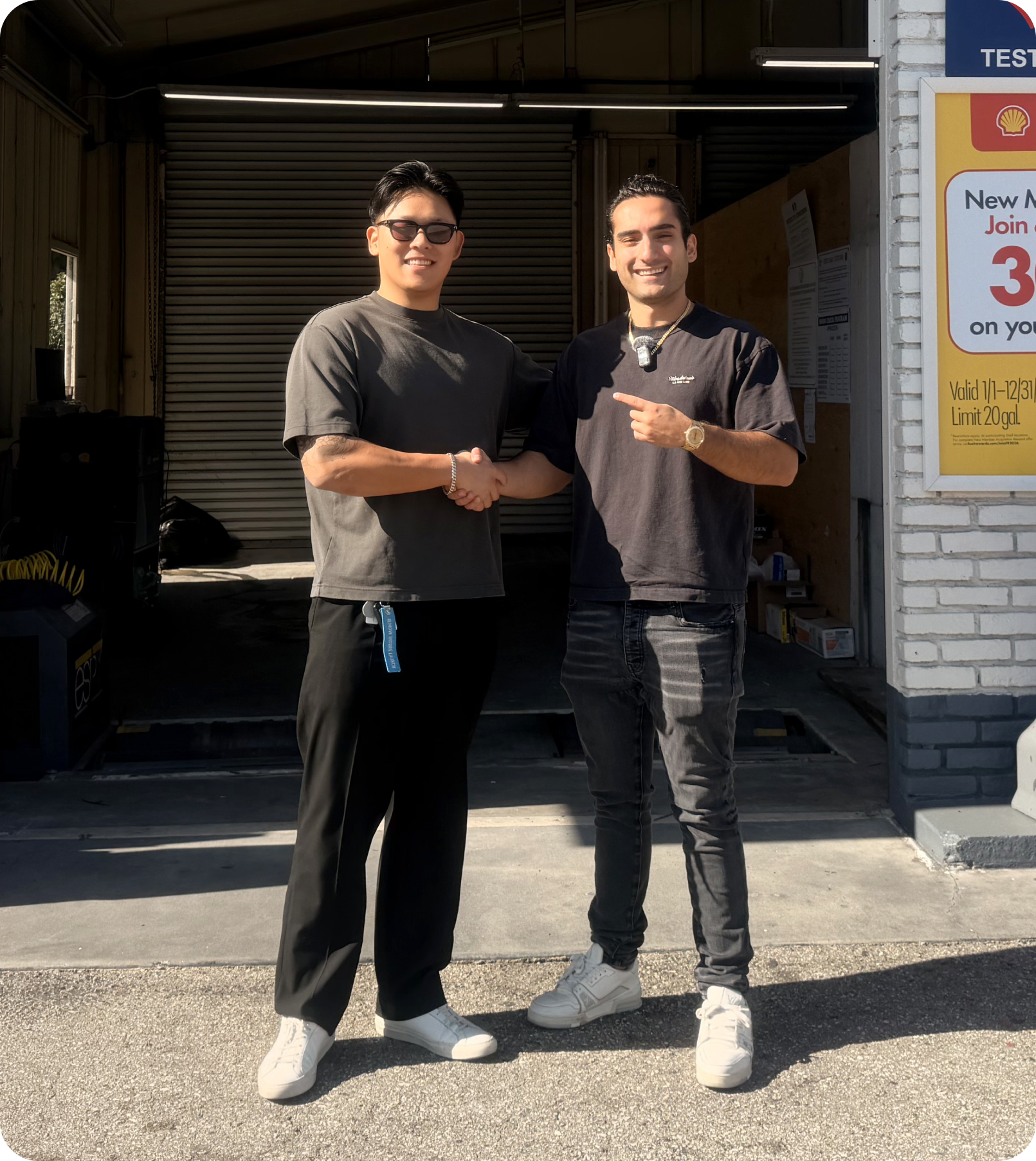 Smog King station owner handshake