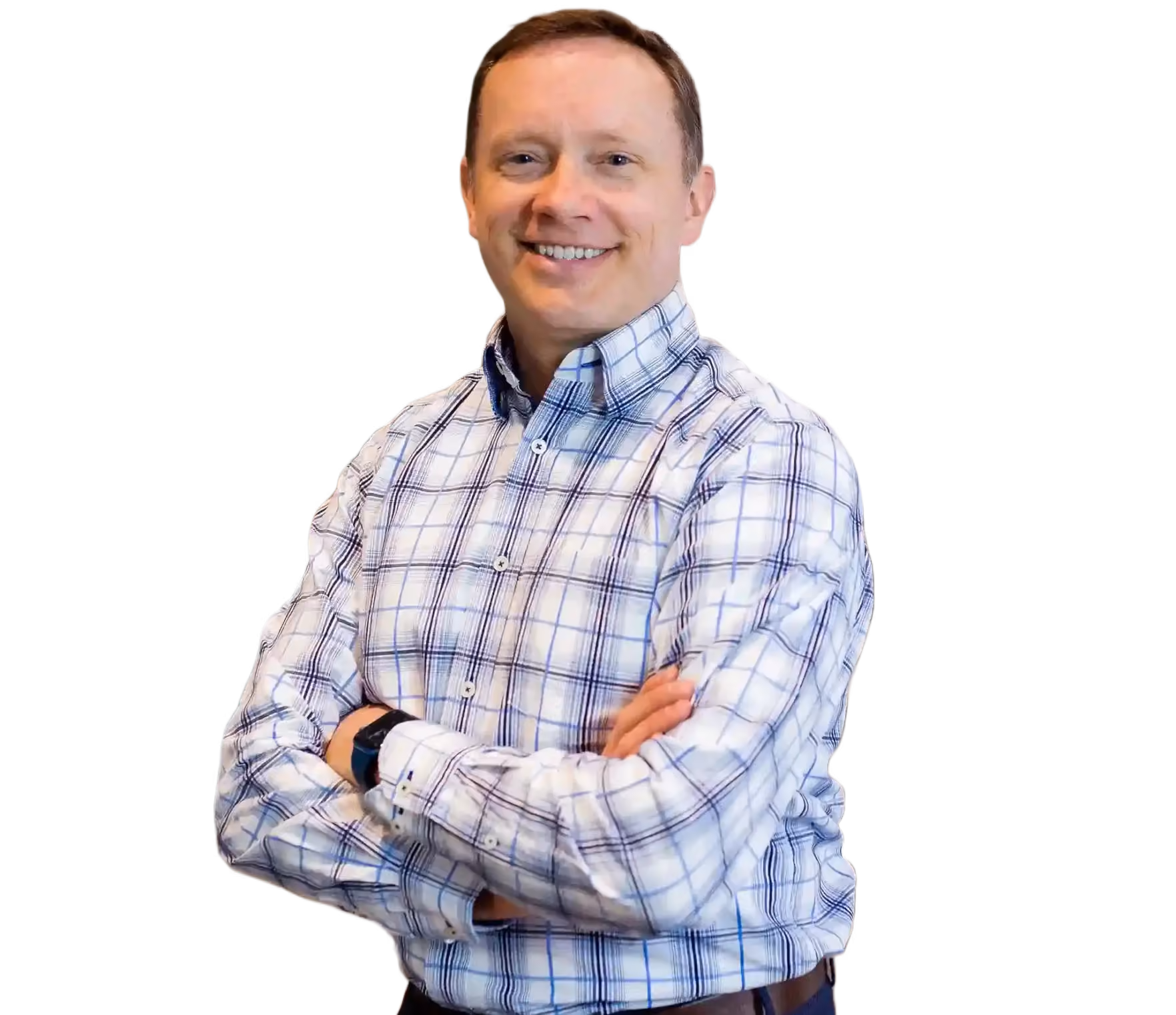 Smiling man with arms crossed wearing a white and blue checkered shirt.