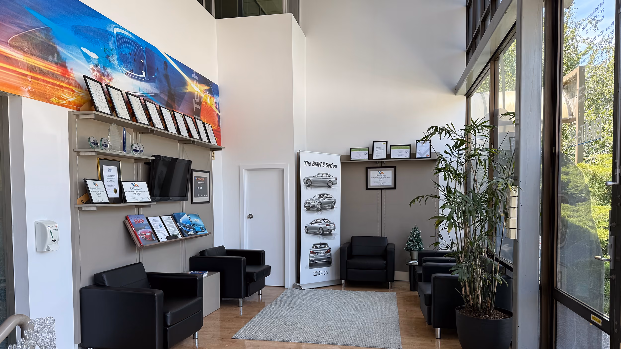 BMT customer waiting area with seating and awards