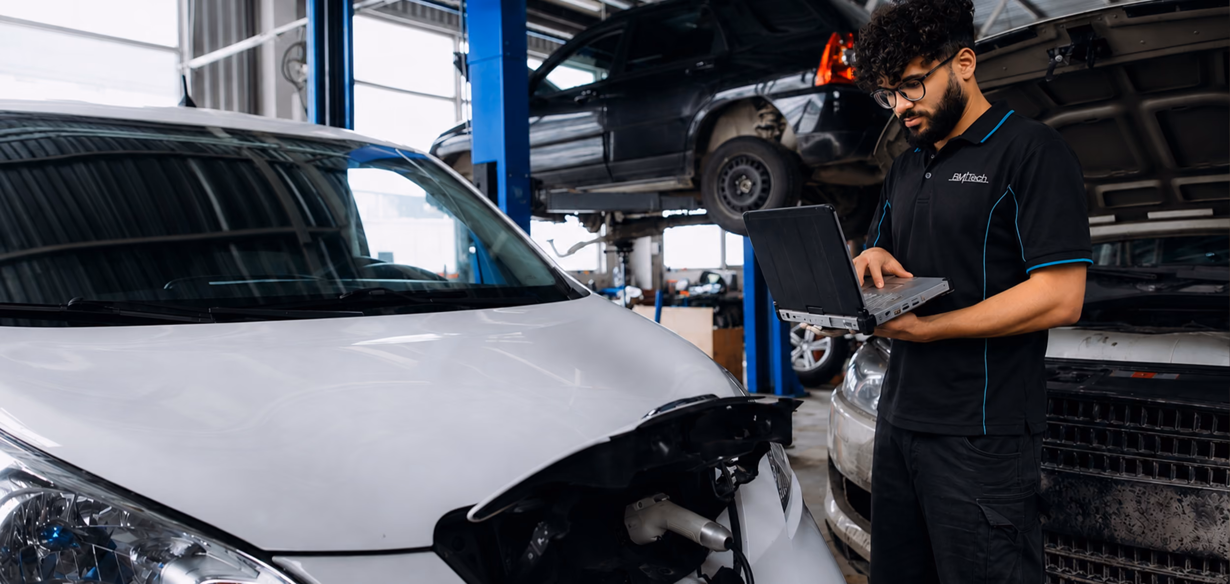Electric or hybrid vehicle in the Auto Tech Group workshop.