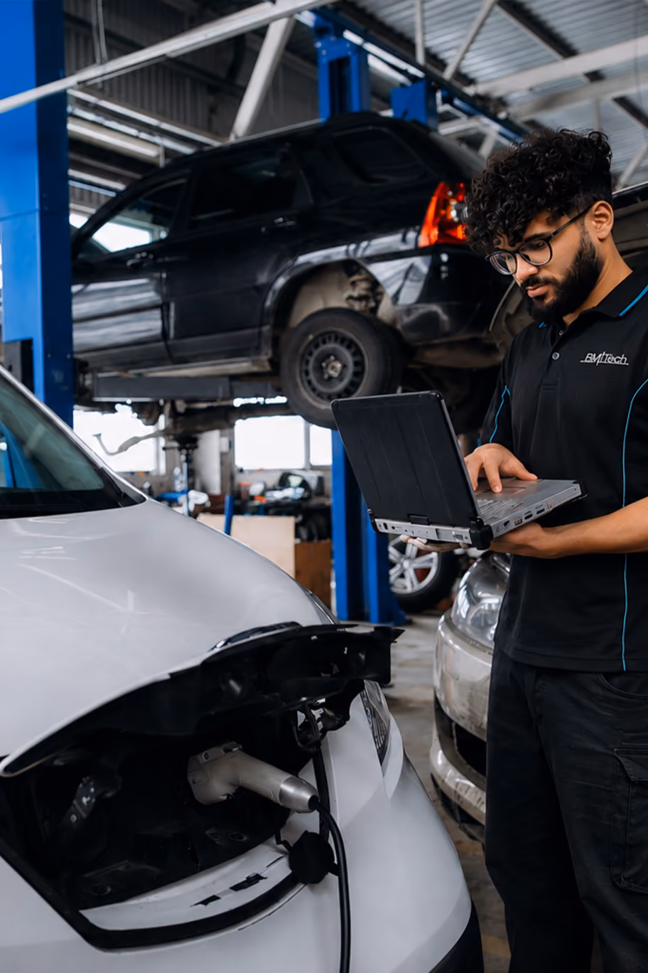 Electric or hybrid vehicle in the Auto Tech Group workshop.