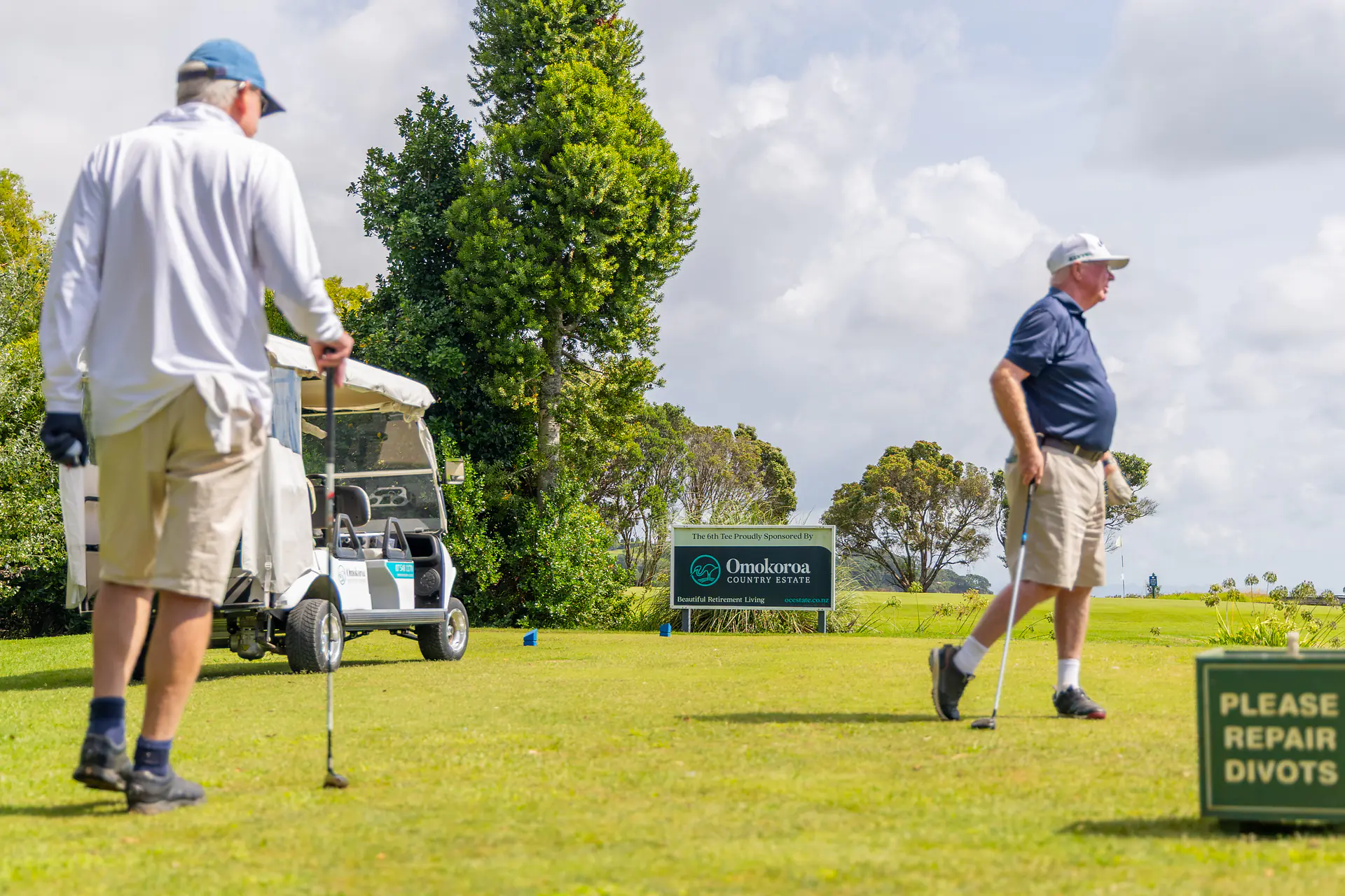 Friends having a drink on the deck at Omokoroa Country Club