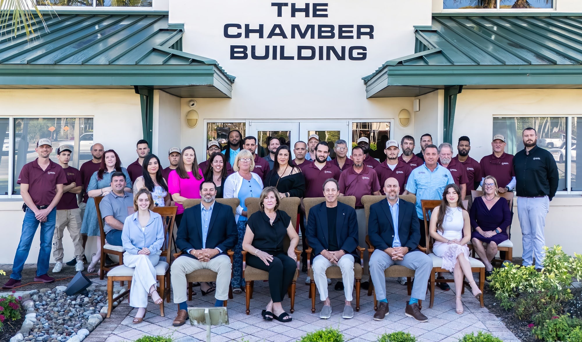 The Executive Electronics team outside their office