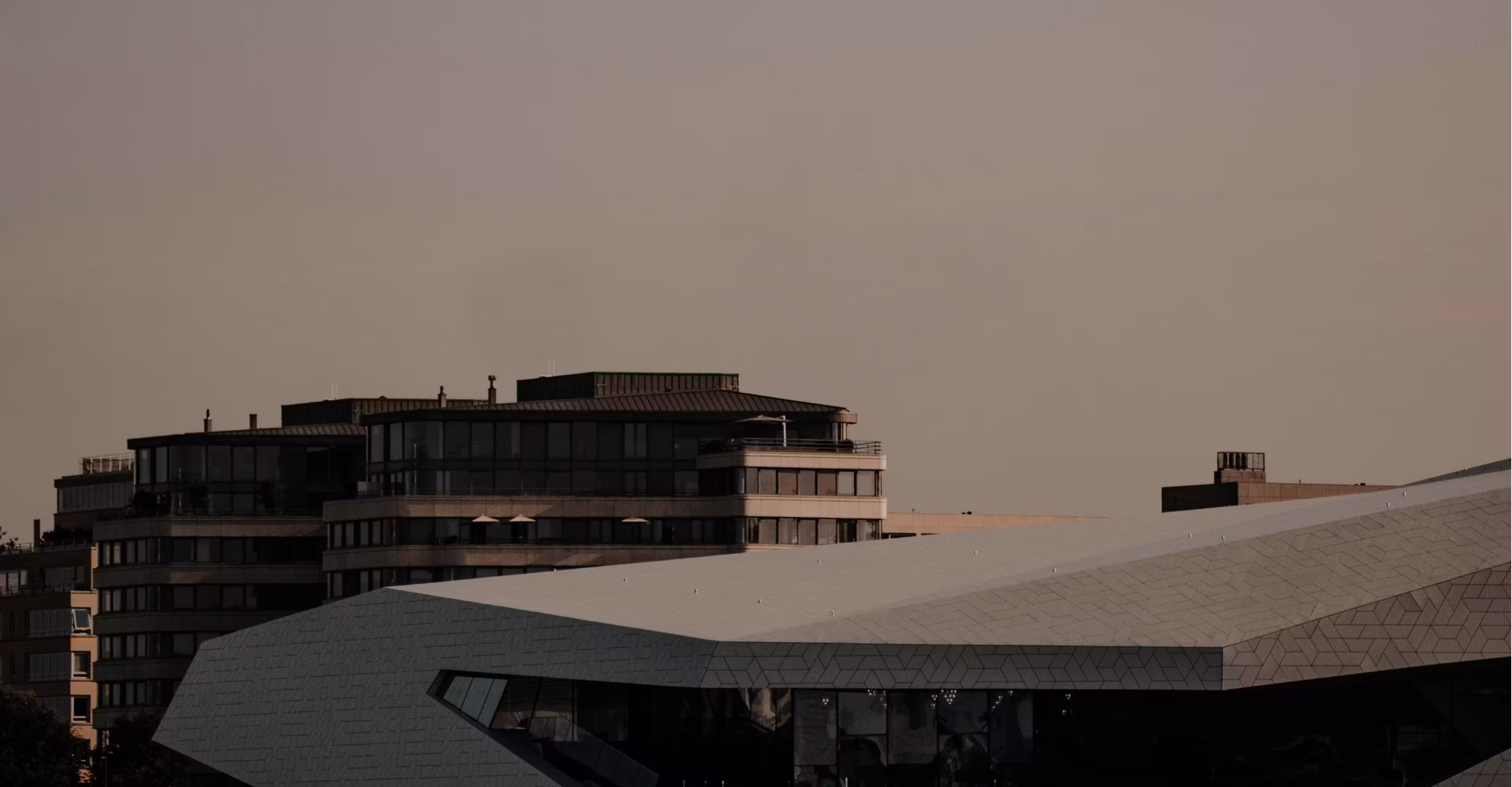 Modern black house exterior at dusk