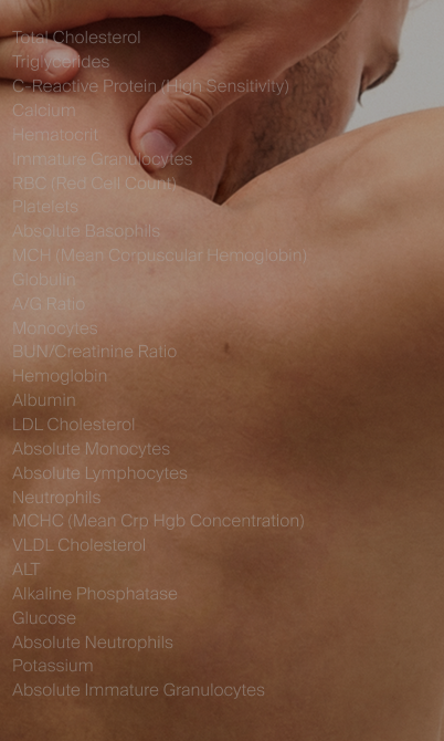 Close-up of a person's back and hand touching their upper back and neck area.