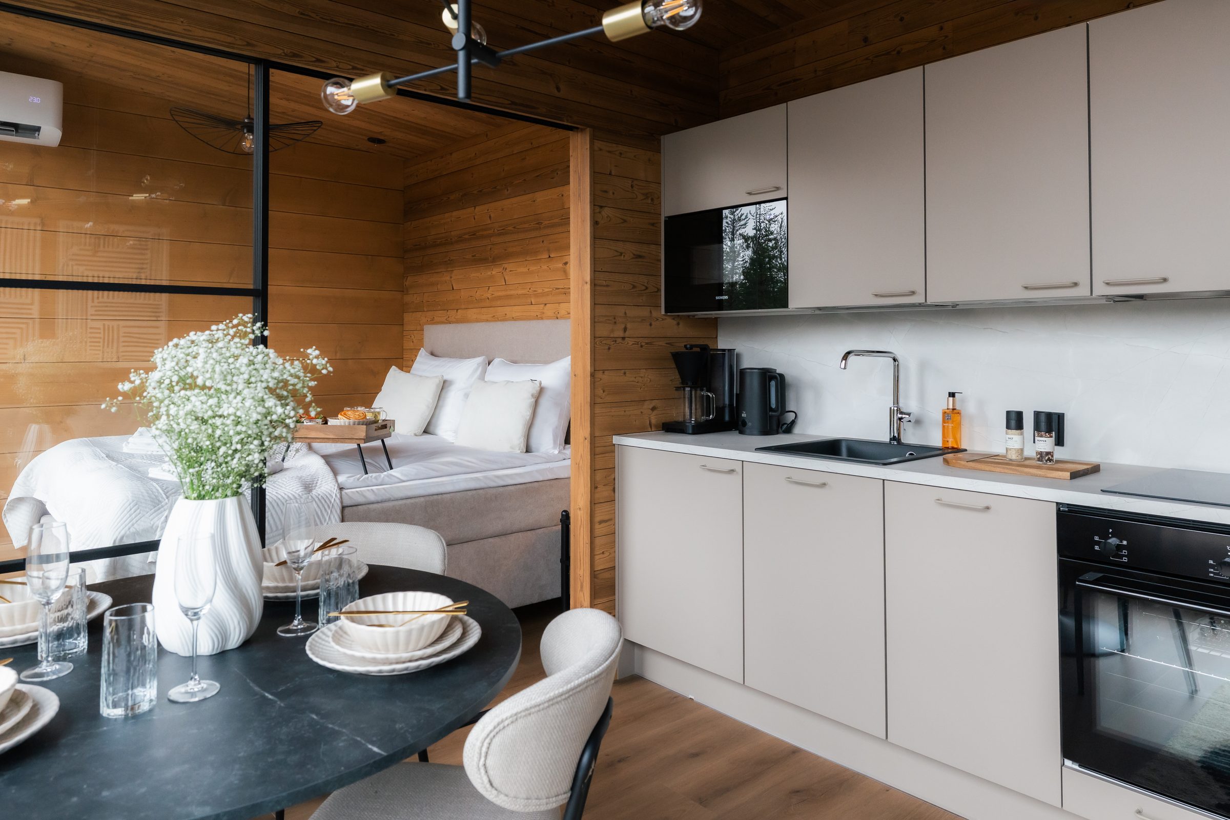 The living space with the wood stove lit