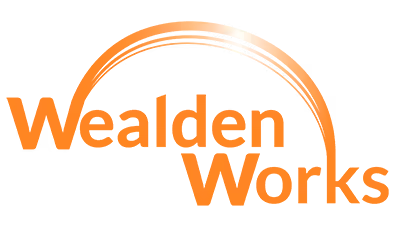 Wealden Works orange logo with curved arch design element