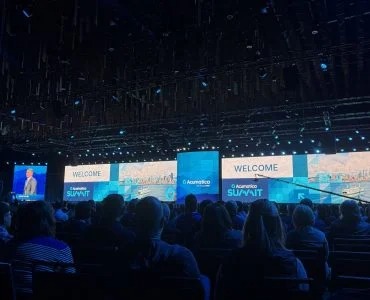 Canary7 team and attendees at Acumatica Summit 2026
