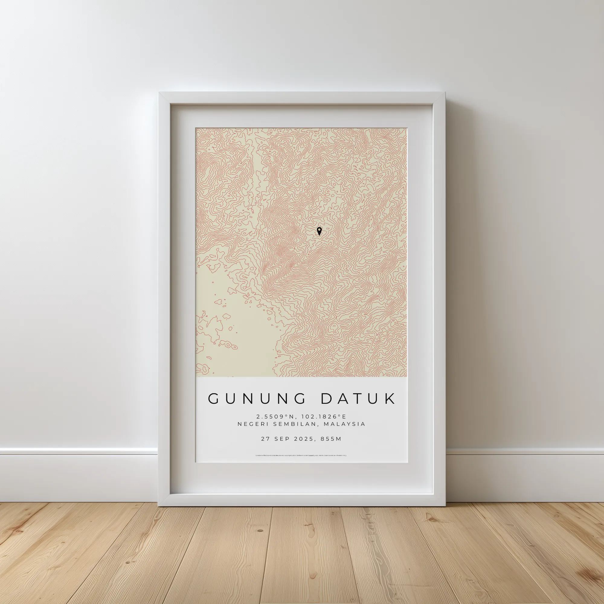 Framed topographic map of Gunung Datuk in Negeri Sembilan, Malaysia, showing contour lines and location marker.