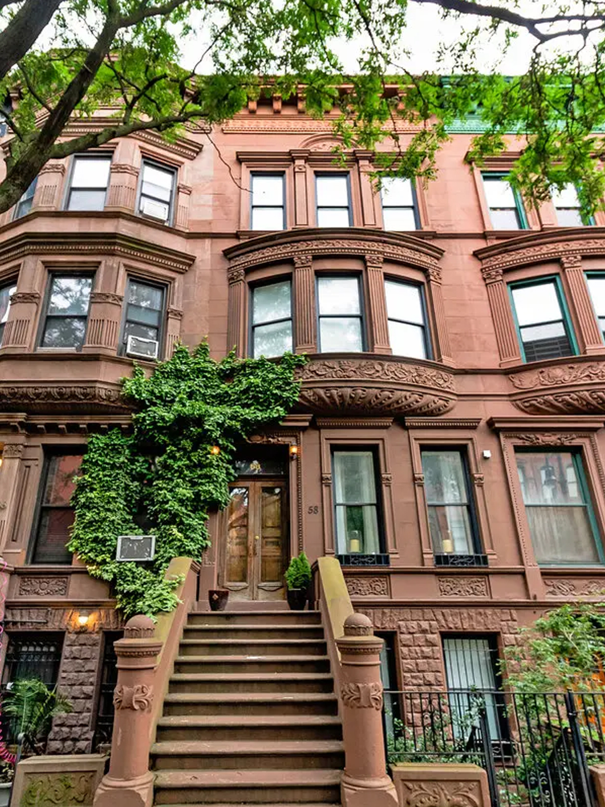 A historic brownstone building in Harlem, New York City