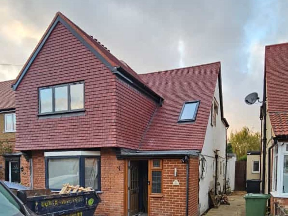 Front of the Langley house, with a new clay tile roof, a tile-hung gable and a roof window