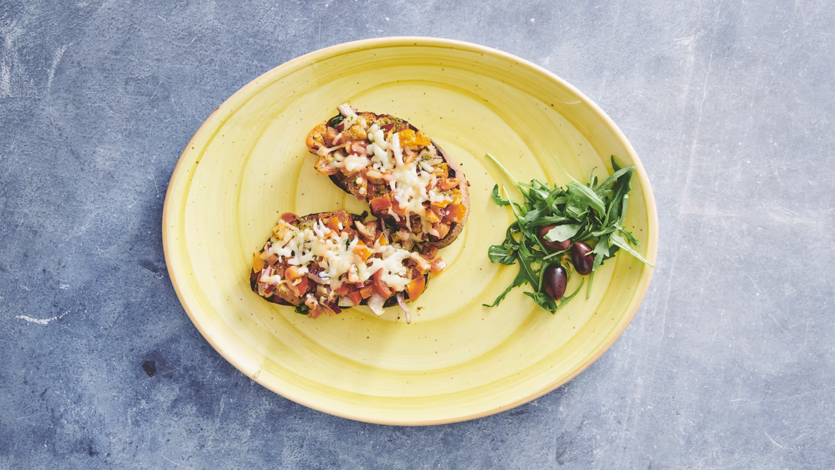 Autentisk italiensk stenovnspizza Bruschetta (2 stk) (V) Grillet brød med marinerede cherrytomater og frisk mozzarella.