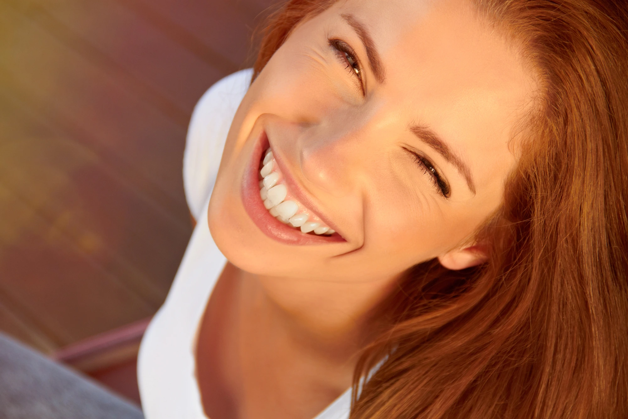 happy after going to the cosmetic dentist in Easley, SC