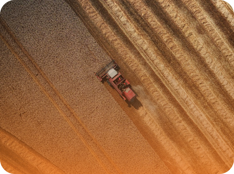 Aerial view of a harvester working a field