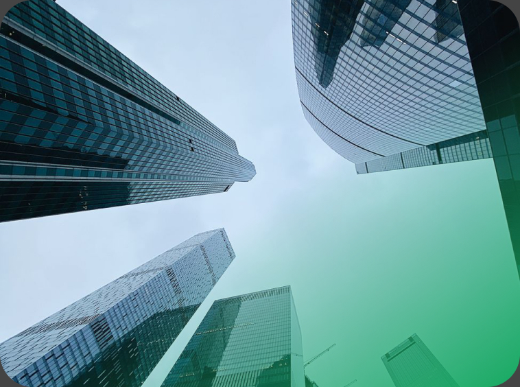 Glass office towers seen from below