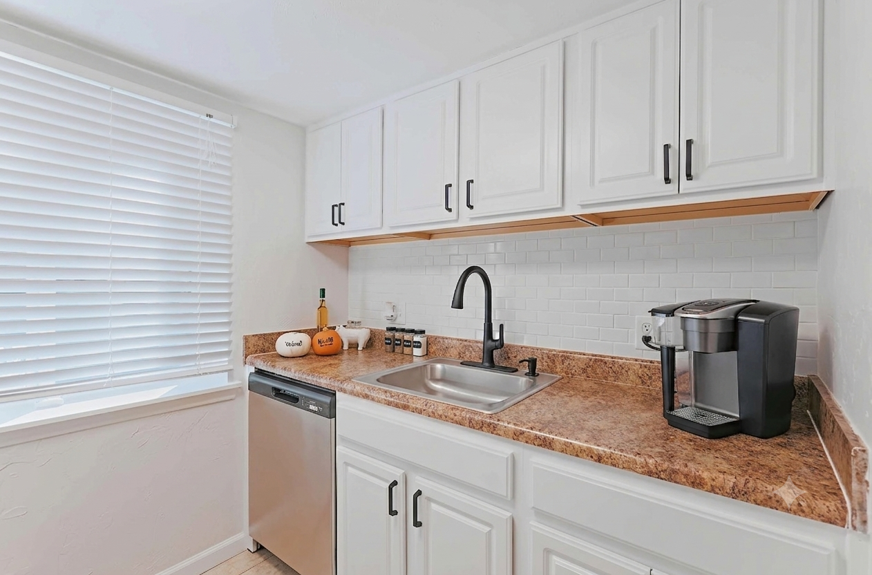Kitchen with white cabinetry