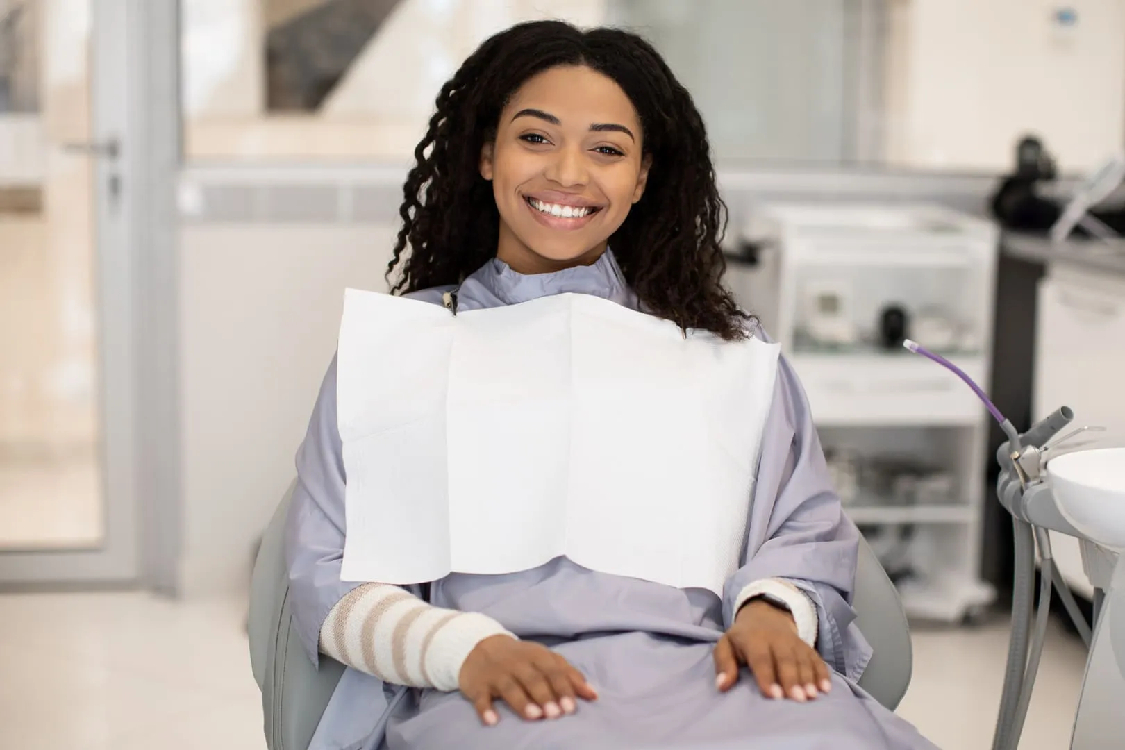 Patient resting comfortably in the chair during a general dentistry visit