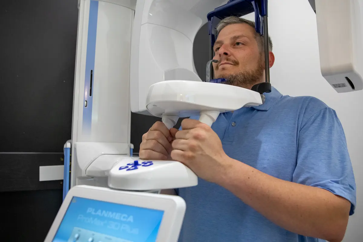 Patient having a digital dental scan taken in the treatment room