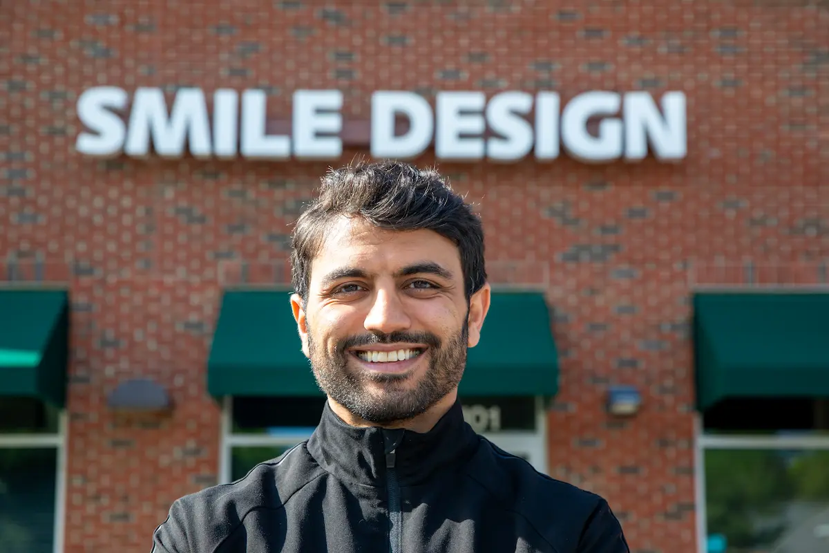 Dr. Erfan Imeni outside the Smile Design Modern Dentistry practice