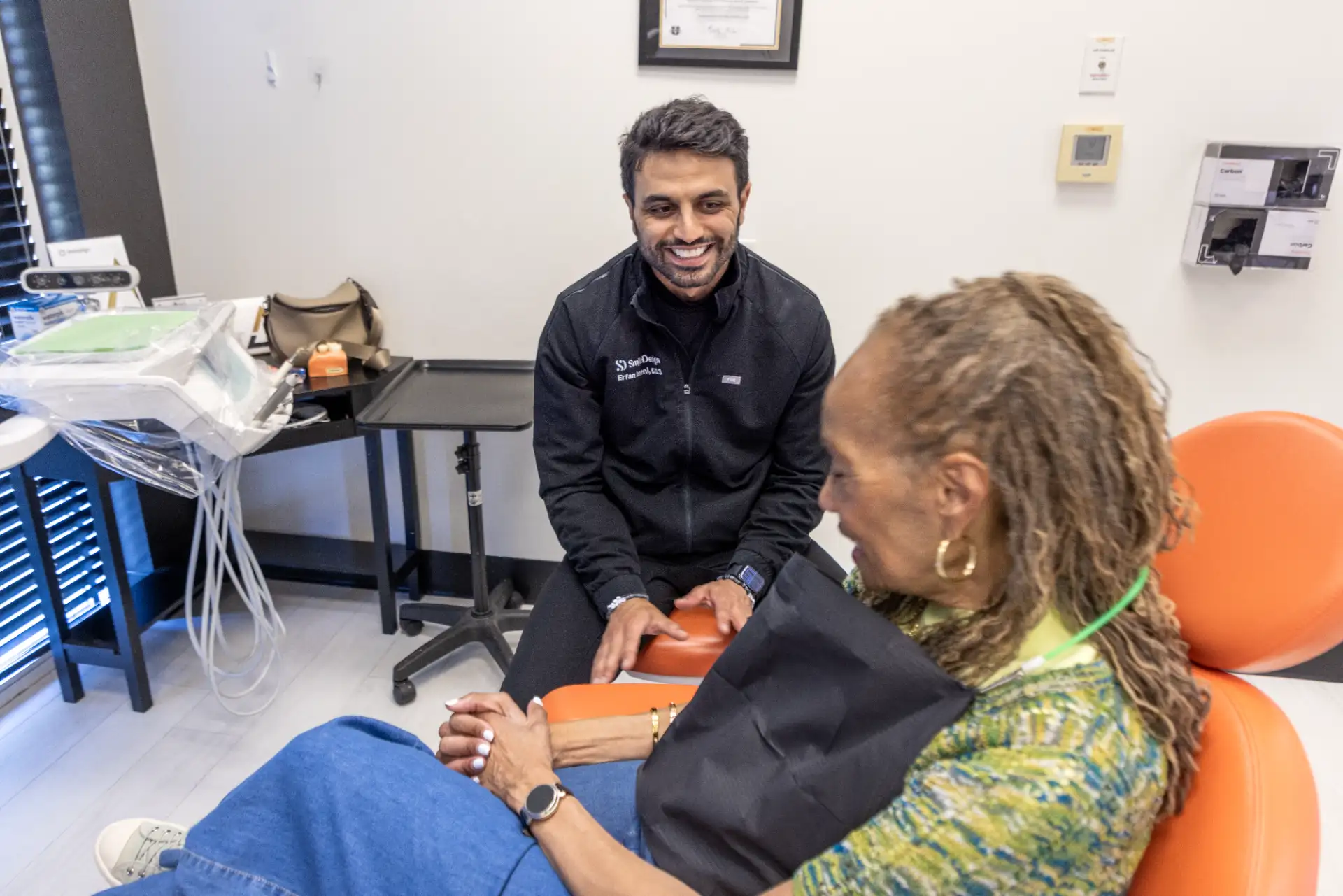 Dentist consulting with a patient about cosmetic dentistry options