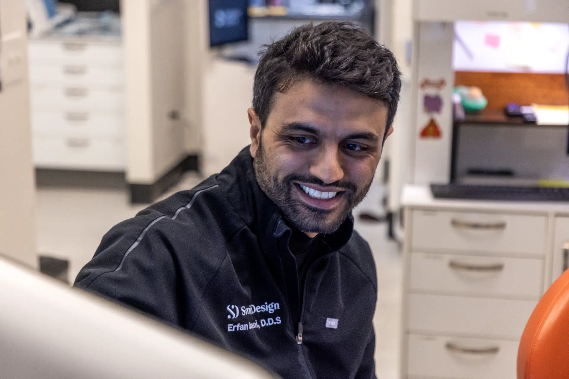 Dentist in a treatment room at Smile Design Modern Dentistry