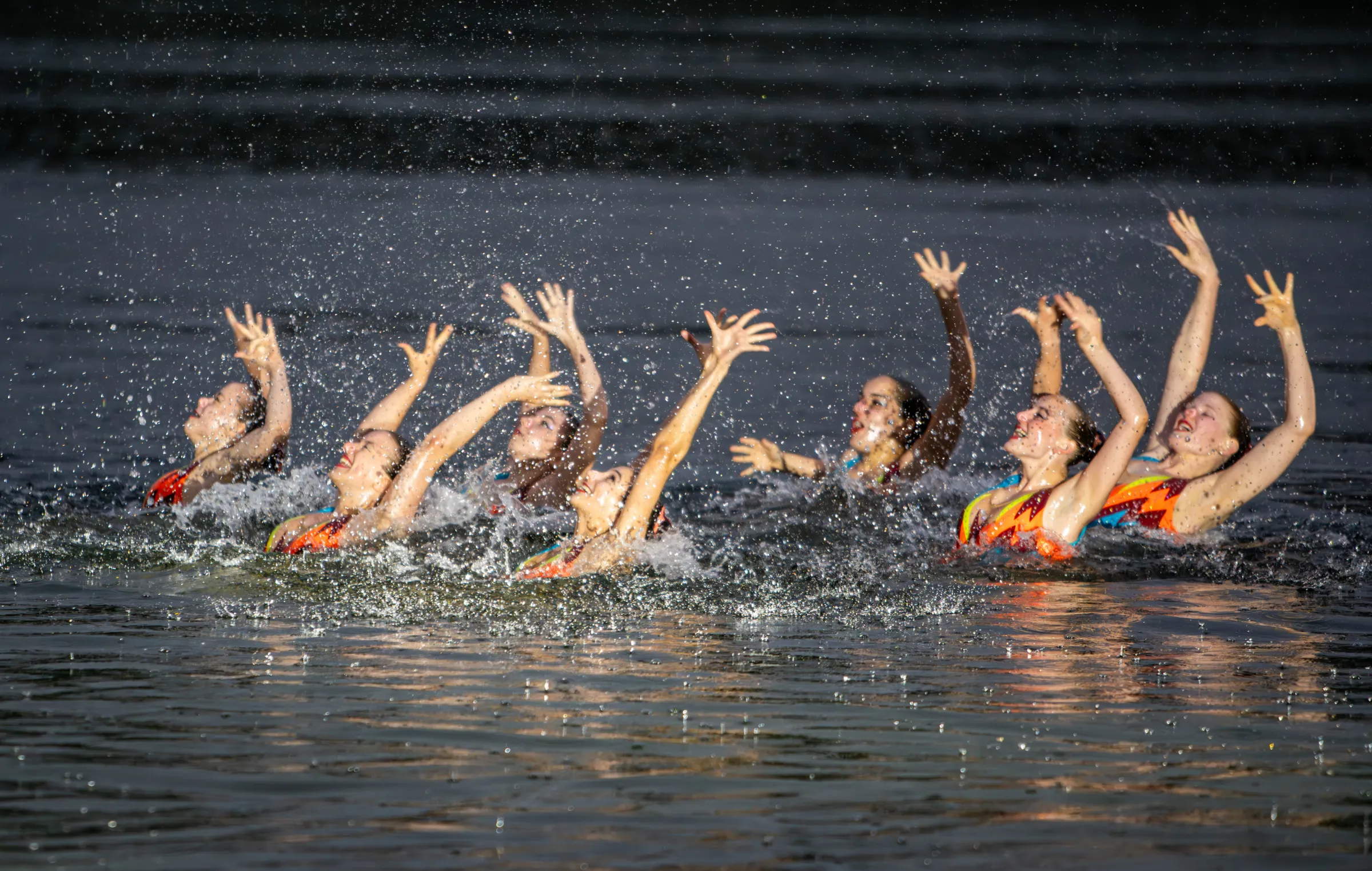 The Isarnixen synchronised swimmers rise from the lake in the rain at the National Air Cargo customer dinner during transport logistic 2025