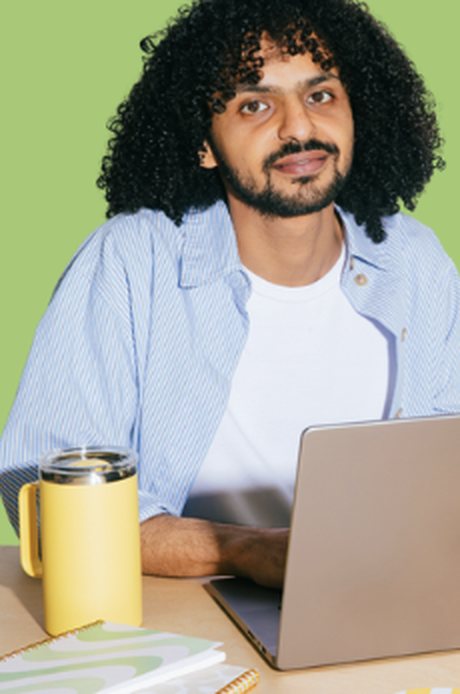 Agent builder working at a laptop