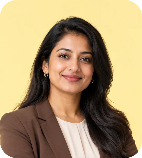 Smiling professional in a brown blazer