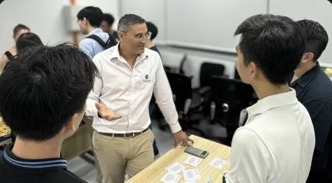 Trainer talking with a group of trainees