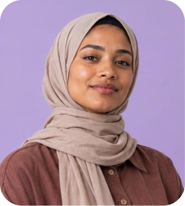 Smiling professional in a brown blazer