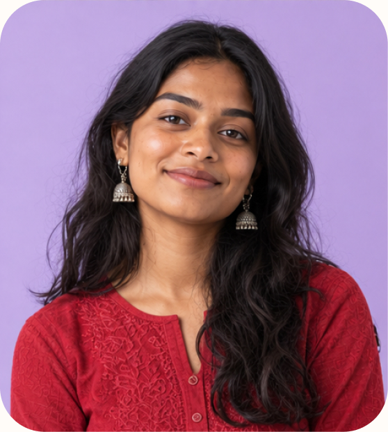 Smiling Aleph Cybersecurity trainee in a red cardigan